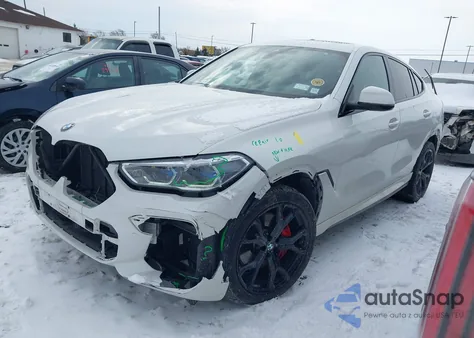 2022 BMW X6 xDrive40I z USA, uszkodzony, nr VIN 5UXCY6C05N9L64520